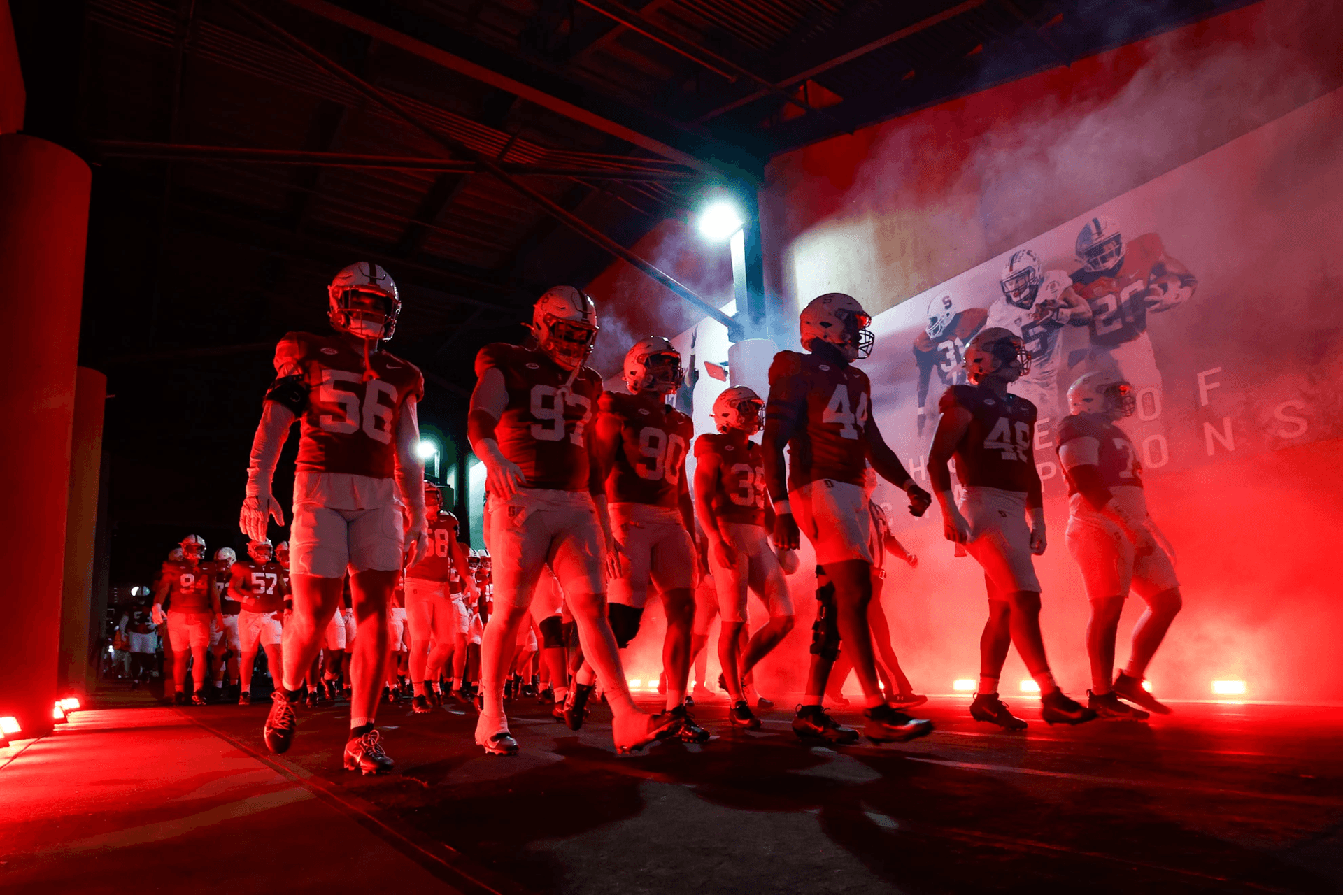 Red smoke and dramatic tunnel lighting for the Stanford Cardinal football team's stadium entrance